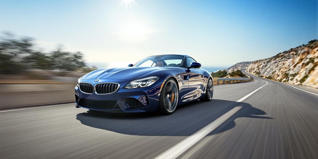 Sleek blue BMW speeding on scenic coastal road.