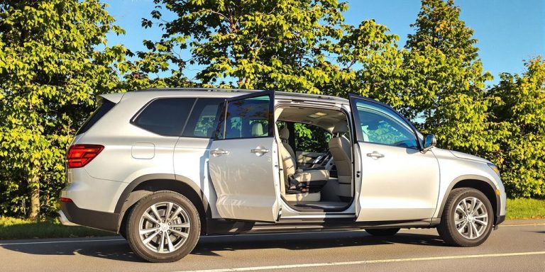 Seven-seater SUV parked on a road.